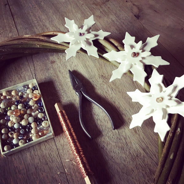 Wreath decorated with porcelain snowflakes