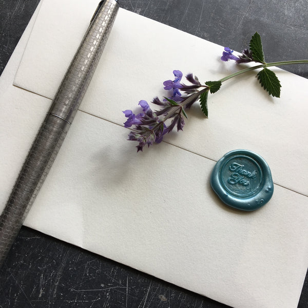 Wax seal with Thank You wording 