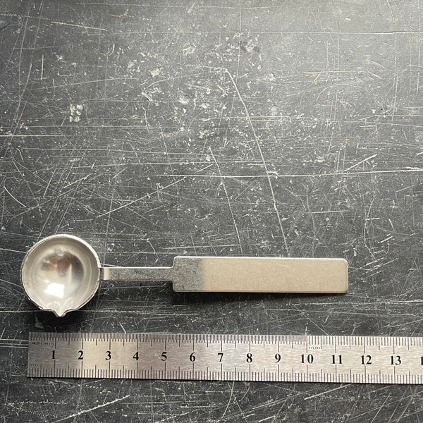 metal spoon for wax