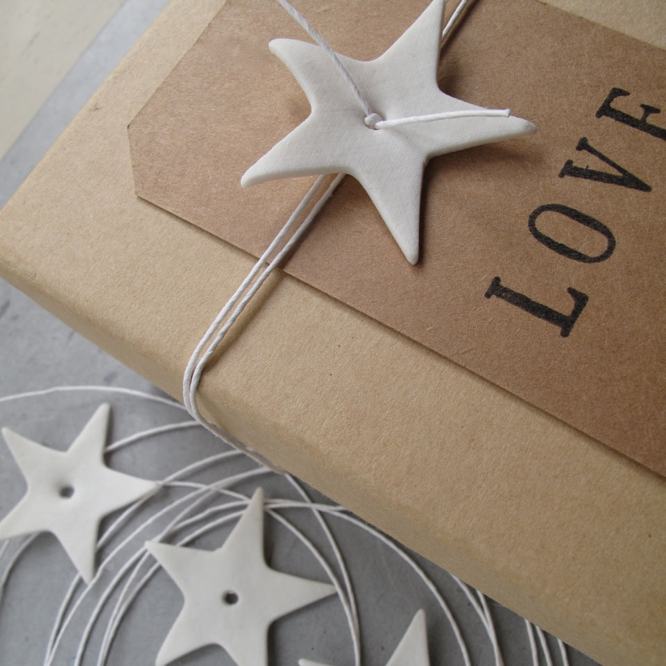 Gift stying with star and paper string