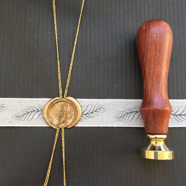 feather seal and ribbon