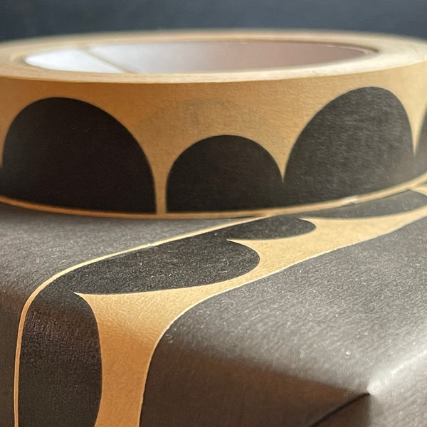 paper tape in scallop design in black and craft colour ideal for wrapping 